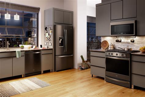 beige kitchen cabinet with black stainless steel appliances|black stainless steel kitchen cabinets.